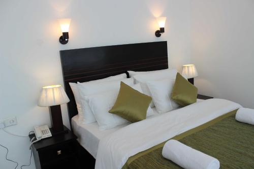 Ένα ή περισσότερα κρεβάτια σε δωμάτιο στο Hillcrest Villa Kandy