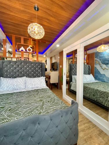 Ένα ή περισσότερα κρεβάτια σε δωμάτιο στο J&J Havenstay Ananda Square