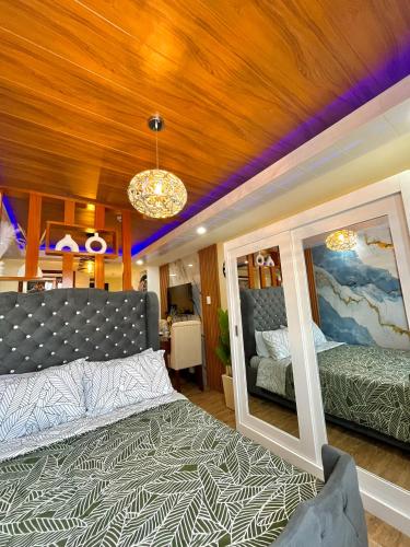 Ένα ή περισσότερα κρεβάτια σε δωμάτιο στο J&J Havenstay Ananda Square
