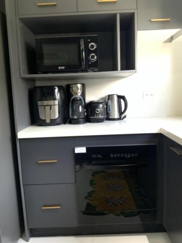 Kuchyň nebo kuchyňský kout v ubytování Paradisiac 1 bedroom