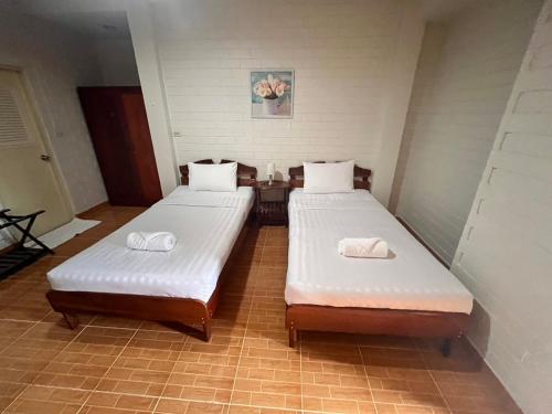 Postel nebo postele na pokoji v ubytování Bunraksa Resort