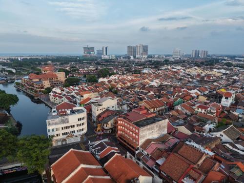 an aerial view of a city with buildings at Heeren Street Boutique Hotel at Jonker Walk in Melaka