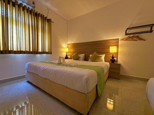 a bedroom with a large bed in a room at Target Range Villa - Luxury Getaway Nestled in the Heart of Badulla in Badulla