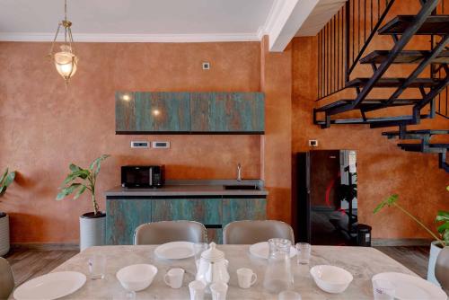 Η κουζίνα ή μικρή κουζίνα στο Bougainvillea Beach Home - Guruvayur - Chavakkad