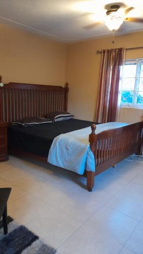 Ένα ή περισσότερα κρεβάτια σε δωμάτιο στο Cozy Studio