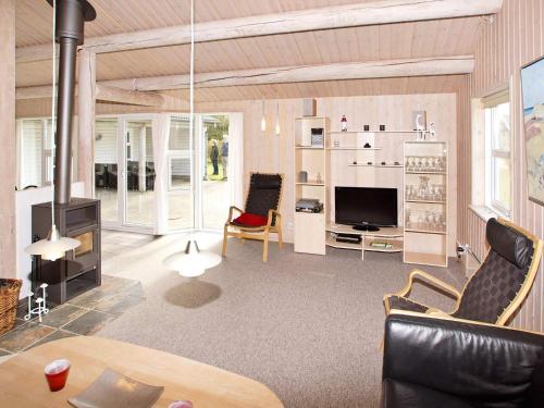 Μια τηλεόραση ή/και κέντρο ψυχαγωγίας στο Modern Cottage with Spa - By Traum Ferienwohnungen