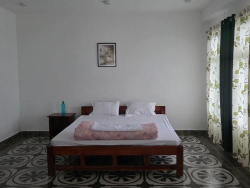 Postel nebo postele na pokoji v ubytování Bagalay Homestay Mungpoo