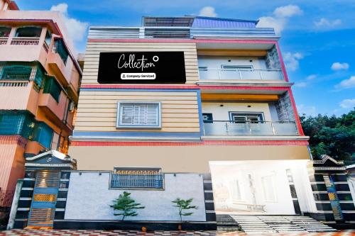 a building with a sign on the side of it at Super Collection O Shyam Bazar Metro Station in Kolkata
