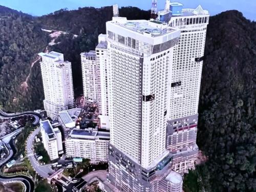 an aerial view of a large skyscraper at Highest Floor, Skyline Studio for 4Pax In Hoverland Genting Highlands in Genting Highlands