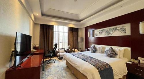 Katil atau katil-katil dalam bilik di New Century Hotel Zaozhuang Fengming