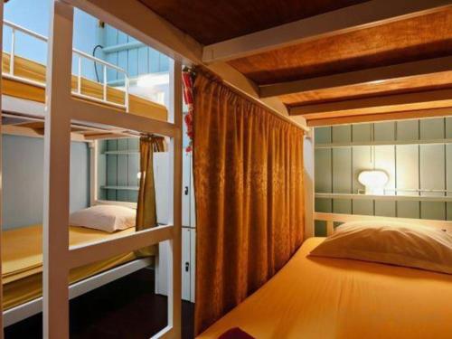 Ένα ή περισσότερα κρεβάτια σε δωμάτιο στο Hua Hin Lub Sabai