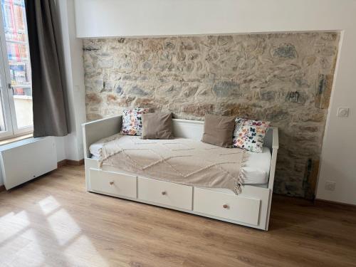 Postel nebo postele na pokoji v ubytování L Atelier Diderot