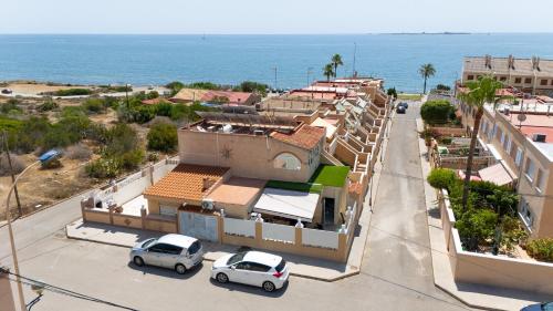 CASA Adosada obra nueva Calas santa pola del este 50 metros del mar