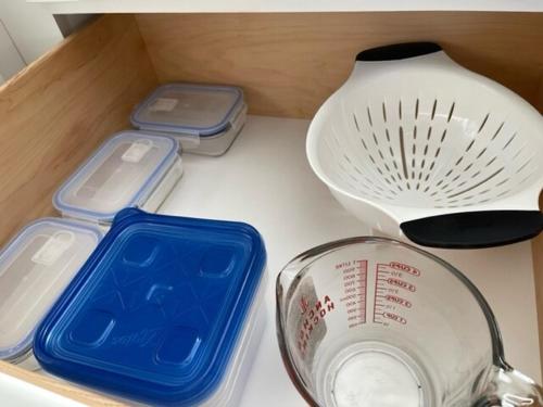 a drawer with a strainer and other kitchen items at The Wild Toro The Wild West 40 Homestead in Cane Beds