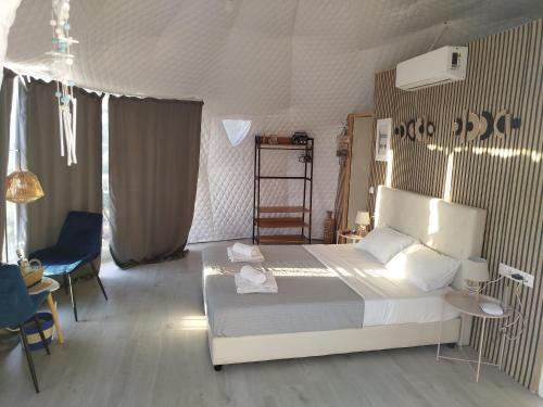 Postel nebo postele na pokoji v ubytování Geo heaven glamp