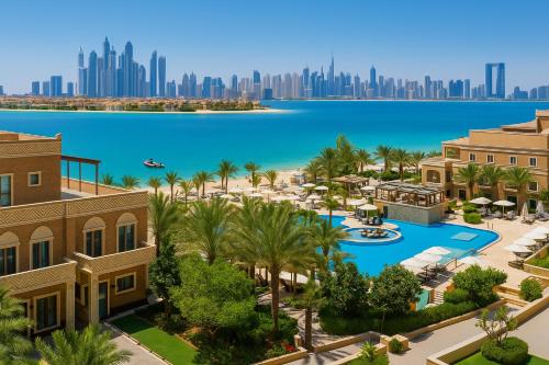 an aerial view of the resort with the city in the background at Wyndham Residences The Palm in Dubai