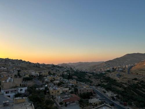 an aerial view of a city at sunset at Petra Brothers in Petra
