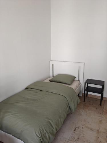 Katil atau katil-katil dalam bilik di All-in kamer te huur in Oostrozebeke