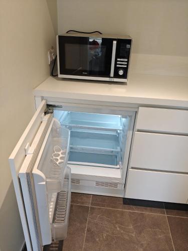 Dapur atau dapur kecil di All-in kamer te huur in Oostrozebeke