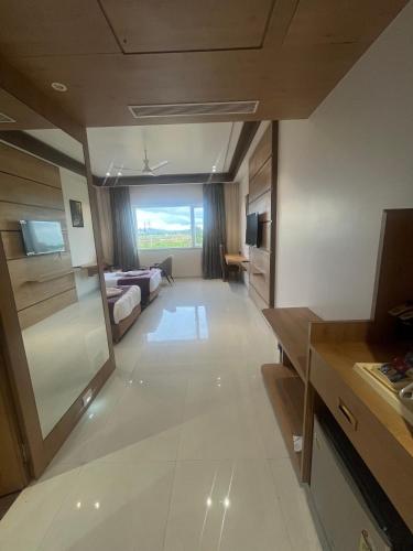 a hotel room with a view of a room at Nirvana Grand Hotel & Resort in Gaya