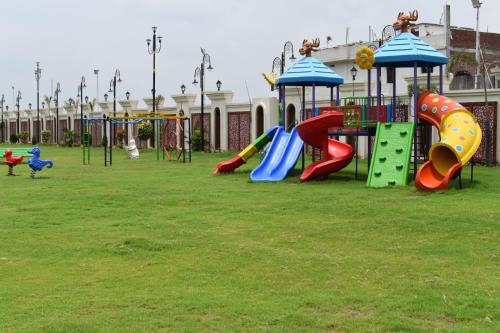 a park with a bunch of playground equipment at Nirvana Grand Hotel & Resort in Gaya