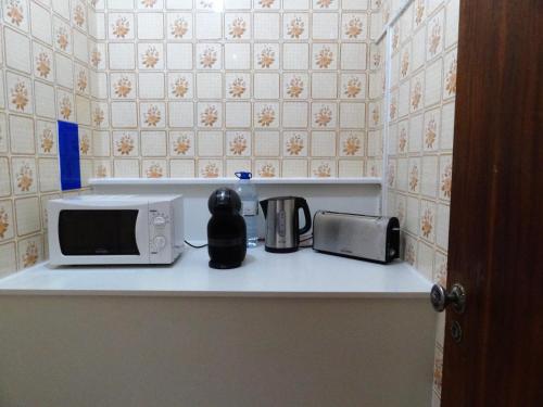 Residencial Espadinha tesisinde mutfak veya mini mutfak