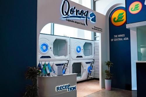 a stand for a company in a trade show at Qo'noq capsule airport hotel in Stantsiya Kyzyl-Tukumachi