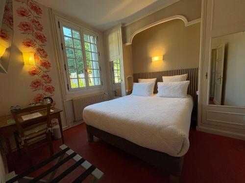 Katil atau katil-katil dalam bilik di Domaine des Châteaux