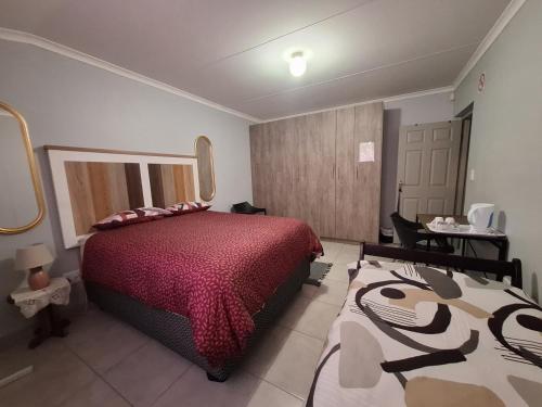 Katil atau katil-katil dalam bilik di Huigu Homestay Accommodation