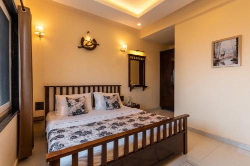 a bedroom with a bed in a room at Peace Stay 2BHK Villa in Bhīm Tāl