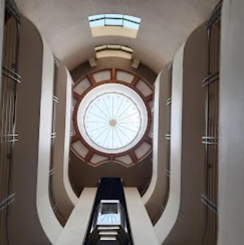 a room with a ceiling with a window in it at Hotel City Park, Solapur in Solapur