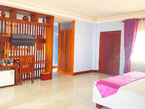 Ένα ή περισσότερα κρεβάτια σε δωμάτιο στο Cheata Suite Villa