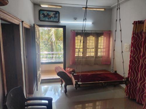 En eller flere senge i et værelse på Green House Resort