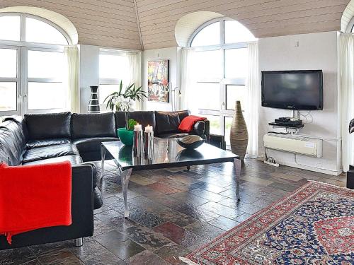 a living room with a couch and a coffee table at Luxury Seaside Retreat - By Traum Ferienwohnungen in Søndervig