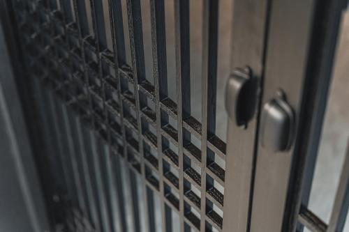 a close up of a metal door of a refrigerator at GOYOO INN & homes in Seoul