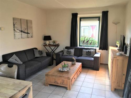 Khu vực ghế ngồi tại Lovely holiday home with private barbecue