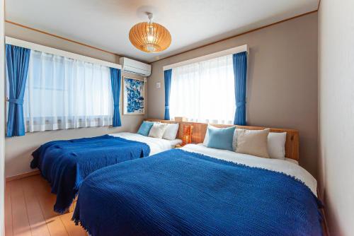 Giường trong phòng chung tại THIRD PLACE TOKYO -Aoto- - Vacation STAY 19579