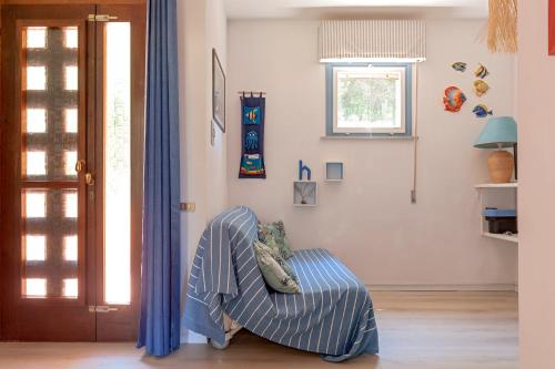 Ένα ή περισσότερα κρεβάτια σε δωμάτιο στο Homiday- Residence Eco- Spiaggia privata e piscina