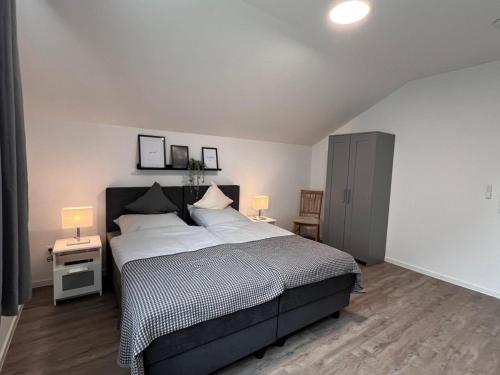 Postel nebo postele na pokoji v ubytování Emsland Hus WG3