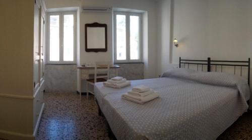 Letto o letti in una camera di Scorci Di Mare