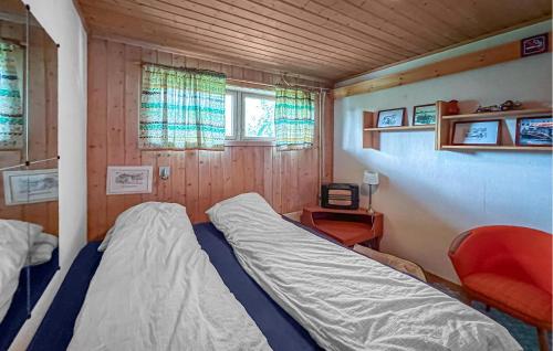 Lovely Home In Hamar With Wifiにあるベッド