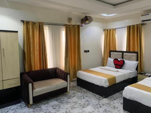 Ένα ή περισσότερα κρεβάτια σε δωμάτιο στο Hilton Garden Hotel