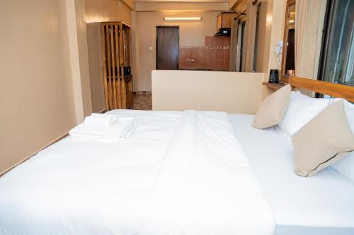 Postel nebo postele na pokoji v ubytování Hotel Anaya