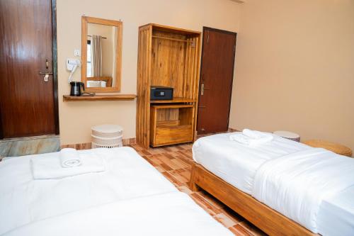 Postel nebo postele na pokoji v ubytování Hotel Anaya