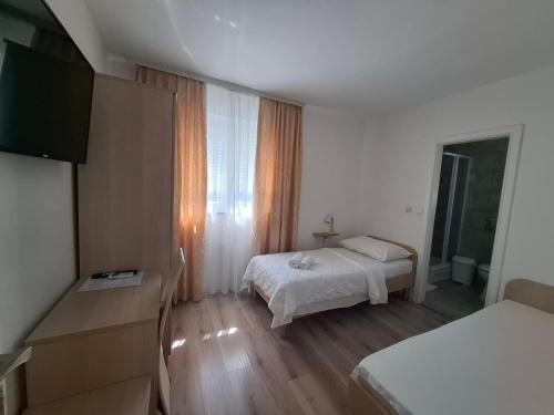 Ένα ή περισσότερα κρεβάτια σε δωμάτιο στο Villa Gaga