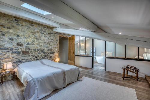 Ένα ή περισσότερα κρεβάτια σε δωμάτιο στο Domaine de L'Essentiel de Lavande