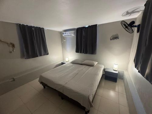 Ένα ή περισσότερα κρεβάτια σε δωμάτιο στο 22A Casa Blenchi