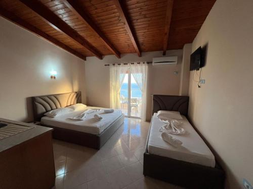 Ένα ή περισσότερα κρεβάτια σε δωμάτιο στο Rahi Room