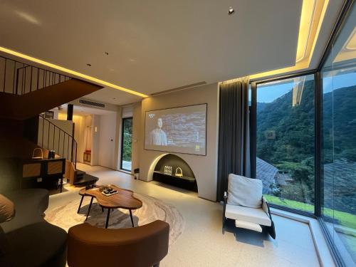 Nature Eco Designer Hotel--Avatar mountain view,Bubble Pool,Free shuttle to south gate of Park Entrance,Local trip plan & Tourism Service,Full Renovation for 10 monthsにあるシーティングエリア