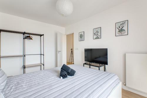 Postel nebo postele na pokoji v ubytování Cocon Chic - 1 Chambre